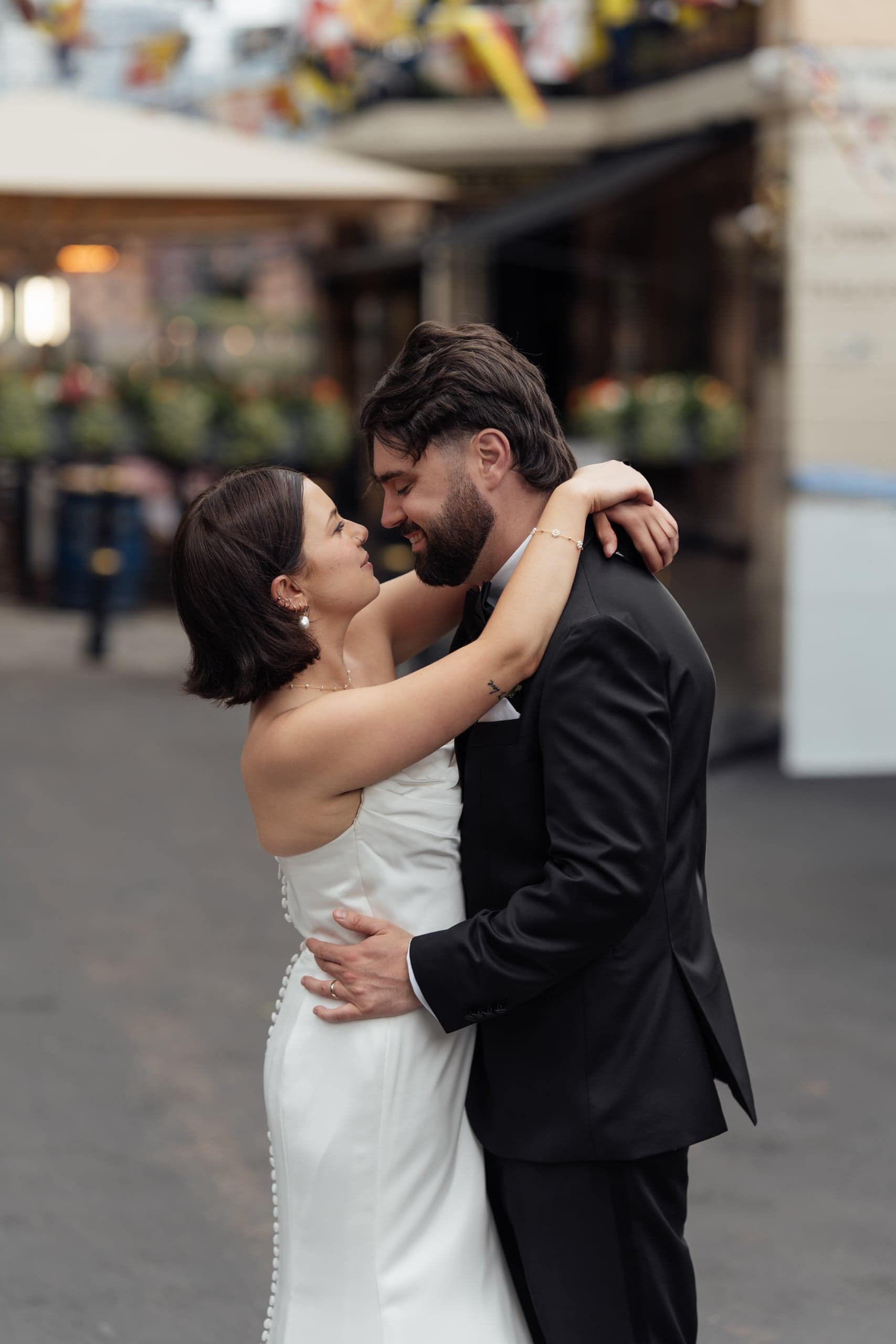 Bride laughing with bouquet at Greenwich wedding