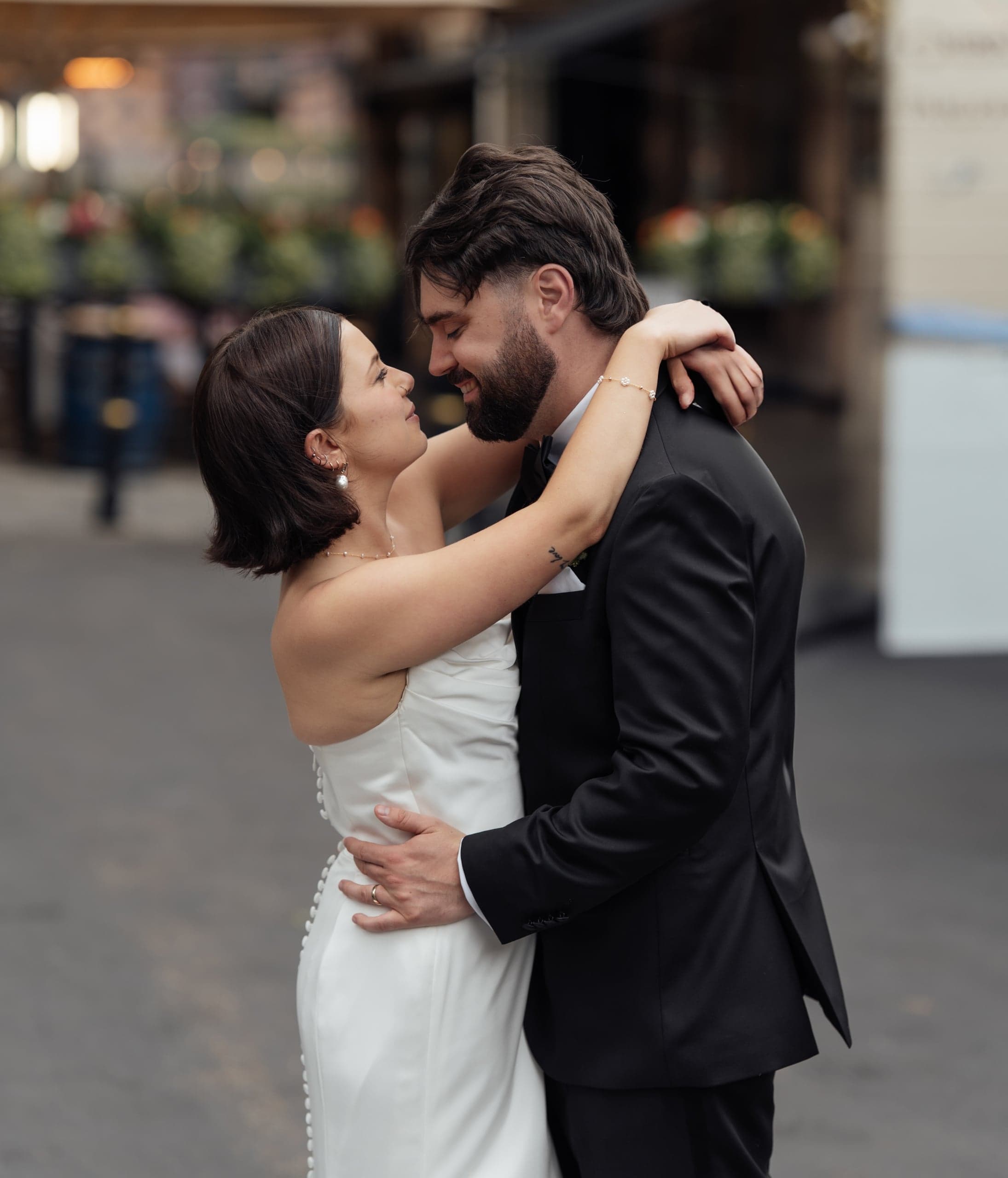 Kirsty and Jamie walking together during their relaxed portrait session at Queens House, Greenwich London