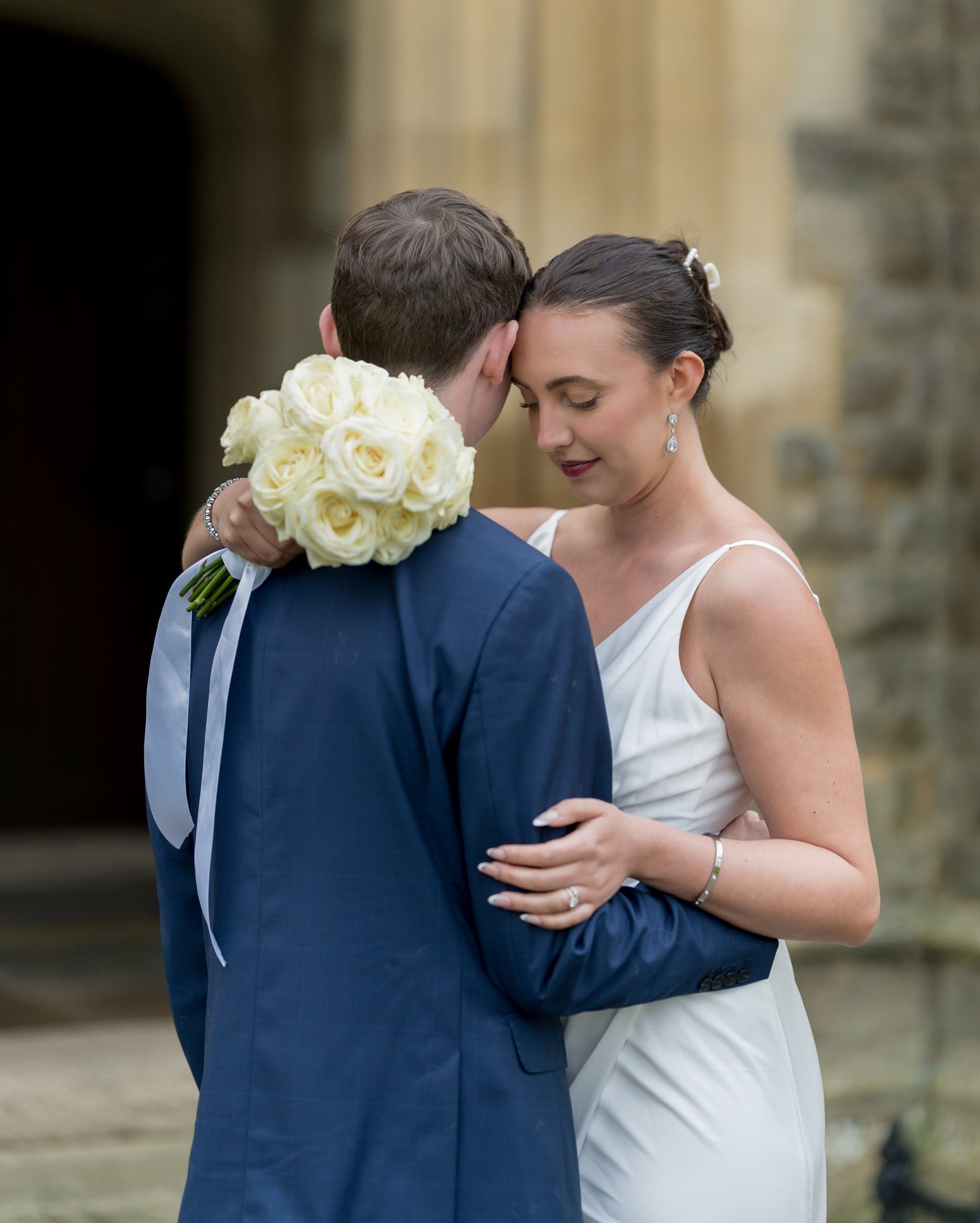 Wedding couple embracing
